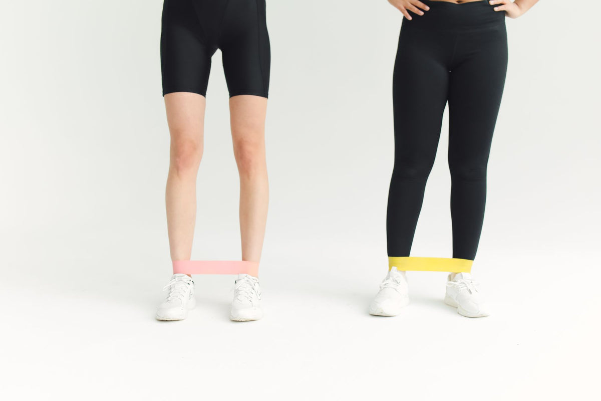 Resistance loop bands in use during a home workout